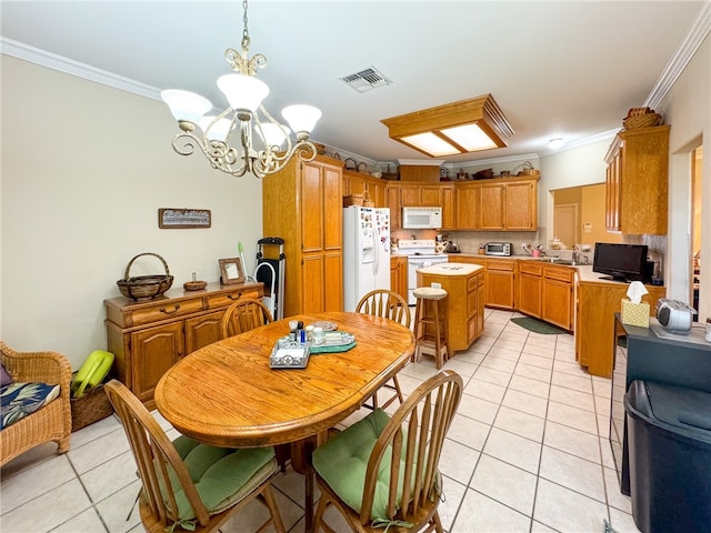 tiled dining area featuring a chandelier and ornamental molding