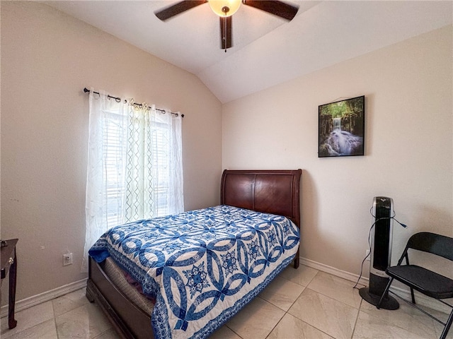 bedroom with lofted ceiling and ceiling fan