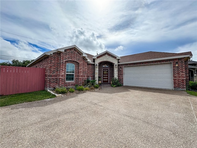 view of front of home with a garage