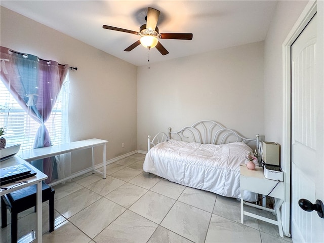 bedroom featuring ceiling fan