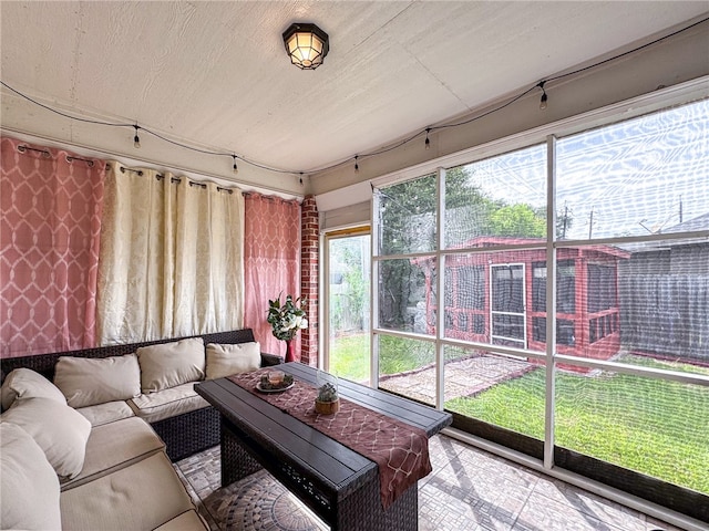 sunroom featuring a healthy amount of sunlight