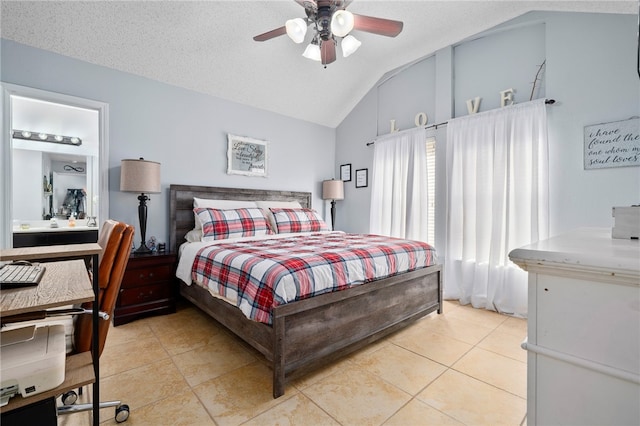 bedroom with light tile patterned floors, a textured ceiling, ceiling fan, and lofted ceiling