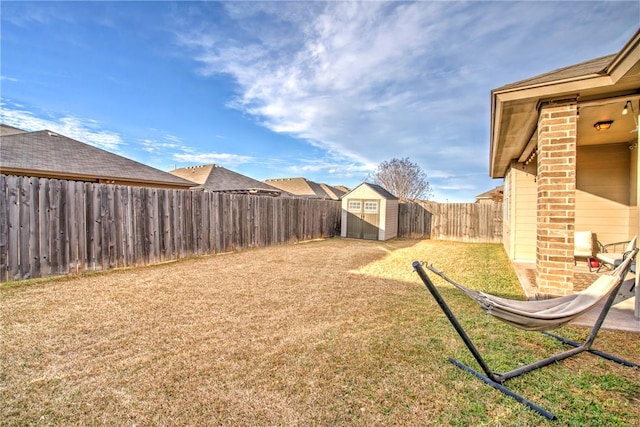 view of yard with a storage shed