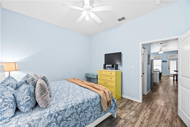 14915 Island Village Dr, Corpus Christi, TX 78418 - bedroom featuring wood finished floors, baseboards, and ceiling fan
