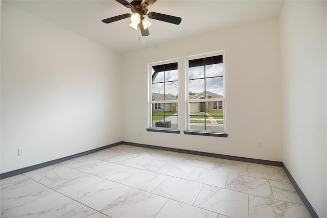 3633 Rebecca Dr, Corpus Christi, TX 78410 - spare room with light marble finish flooring, baseboards, and a ceiling fan