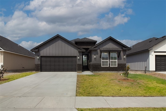 3633 Rebecca Dr, Corpus Christi, TX 78410 - view of front of house featuring an attached garage, driveway, and a front yard