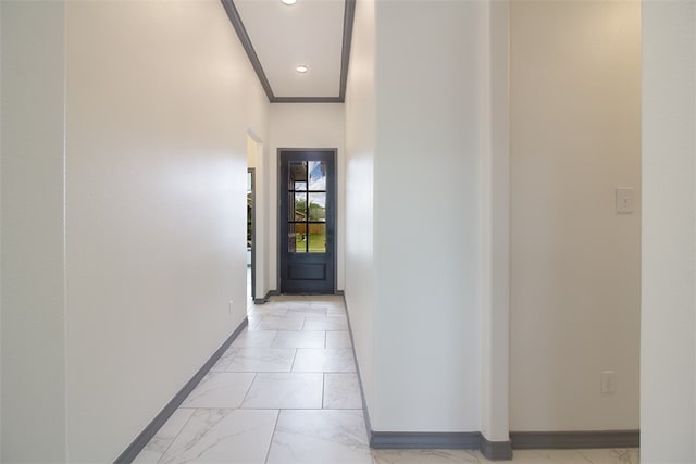 3633 Rebecca Dr, Corpus Christi, TX 78410 - hall featuring baseboards, light marble finish floors, recessed lighting, and crown molding