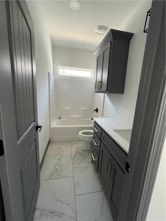 bathroom with shower / bath combination, toilet, marble finish floor, and vanity