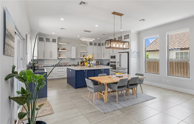15130 Reales Dr, Corpus Christi, TX 78418 - dining space featuring light tile patterned flooring and recessed lighting