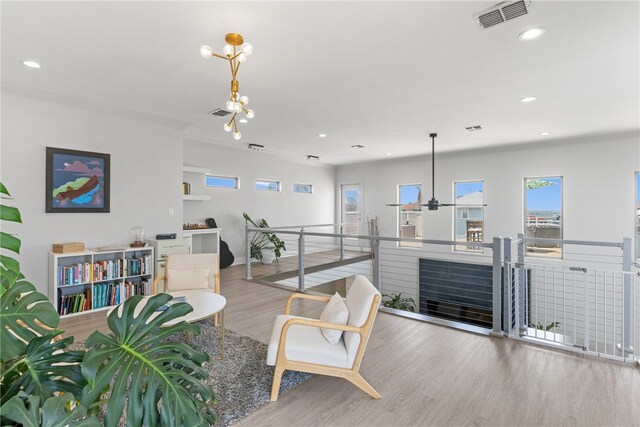 15130 Reales Dr, Corpus Christi, TX 78418 - living room featuring wood finished floors and recessed lighting