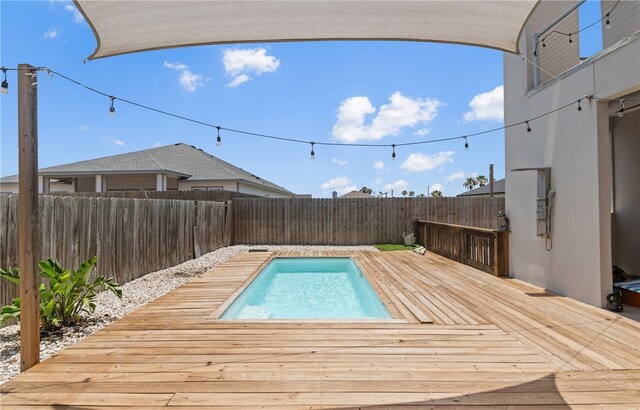15130 Reales Dr, Corpus Christi, TX 78418 - view of pool featuring a fenced backyard and a deck