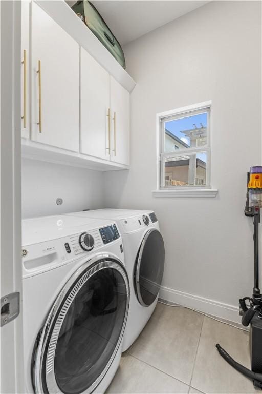 15130 Reales Dr, Corpus Christi, TX 78418 - laundry area with separate washer and dryer, cabinet space, and light tile patterned floors