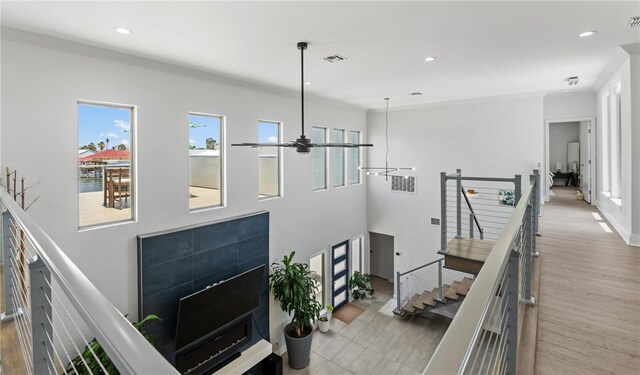 15130 Reales Dr, Corpus Christi, TX 78418 - hall with an upstairs landing, recessed lighting, and light wood finished floors