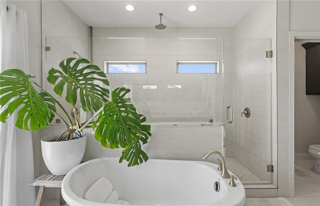 15130 Reales Dr, Corpus Christi, TX 78418 - full bathroom featuring a stall shower, a freestanding tub, and recessed lighting