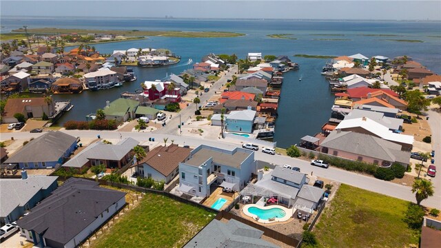 15130 Reales Dr, Corpus Christi, TX 78418 - aerial view of residential area featuring a large body of water and a pool