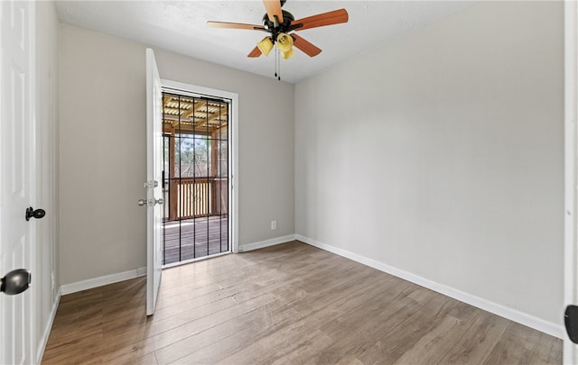 5302 Bonham St, Corpus Christi, TX 78415 - unfurnished room featuring wood finished floors, baseboards, and ceiling fan