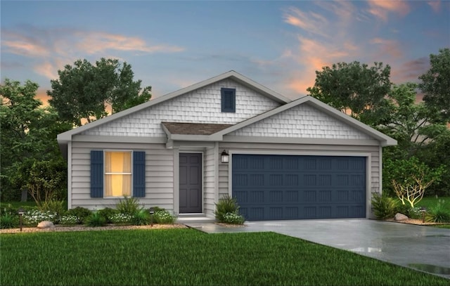 view of front of home with a garage and a yard