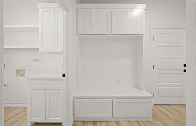 mudroom with light wood-type flooring