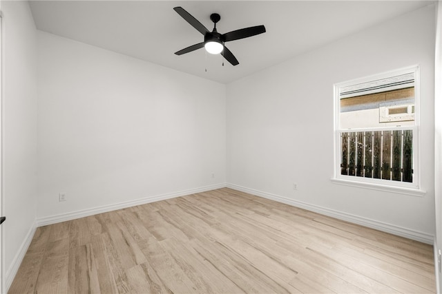 spare room featuring ceiling fan and light hardwood / wood-style floors