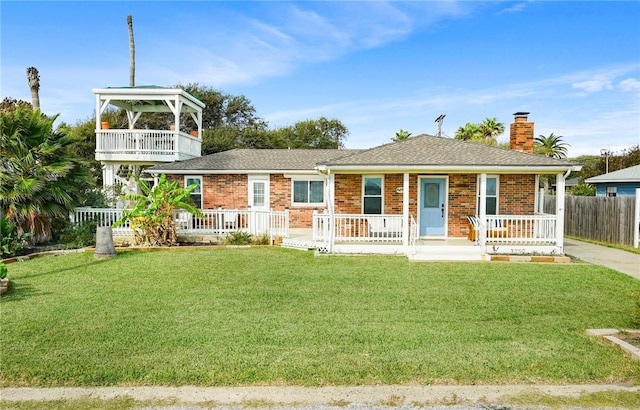 view of front of home with a front lawn