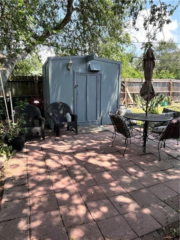 729 Chase Dr, Corpus Christi, TX 78412 - fenced backyard featuring a patio area