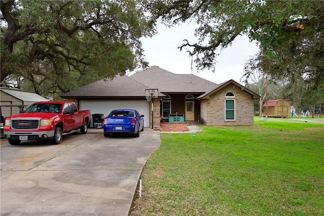 ranch-style home with a garage and a front yard