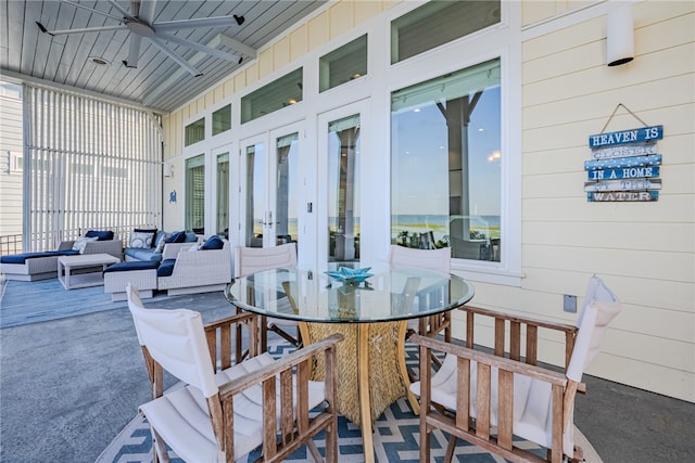 sunroom / solarium with ceiling fan