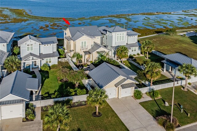 drone / aerial view featuring a water view