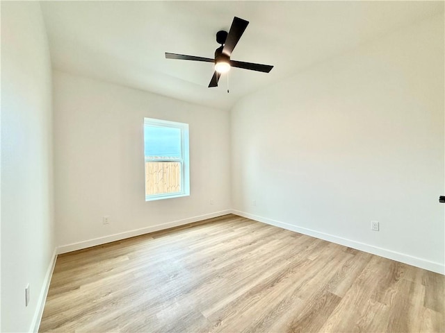 spare room with ceiling fan and light hardwood / wood-style flooring