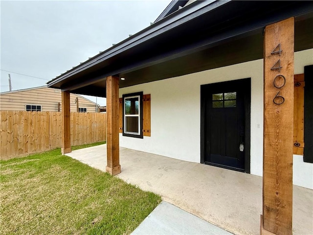 exterior space with a patio area and a yard