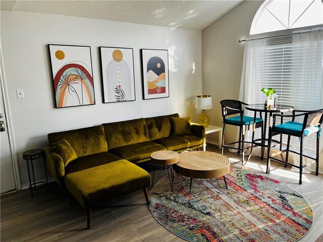 bedroom featuring visible vents, baseboards, carpet, vaulted ceiling, and a ceiling fan