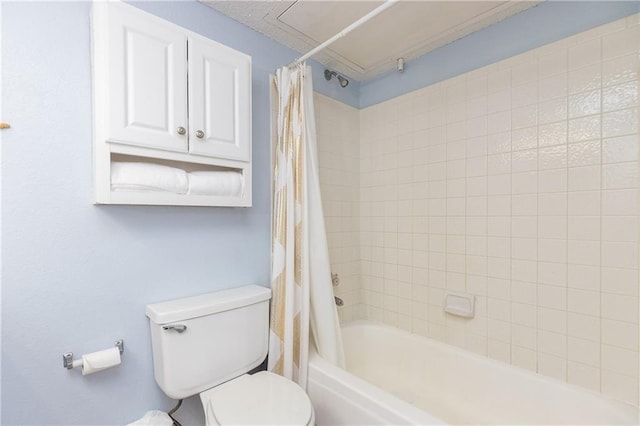 full bath with shower / bath combo with shower curtain and toilet