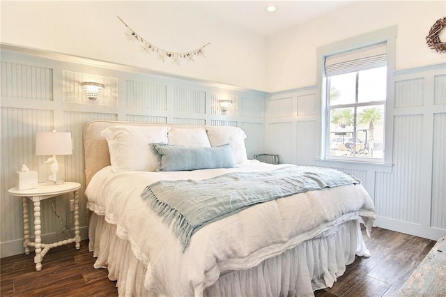 bedroom featuring dark wood-type flooring