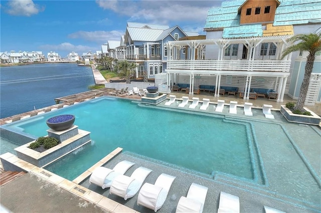 view of swimming pool featuring a pergola