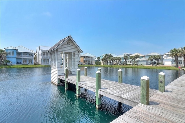 dock area with a water view