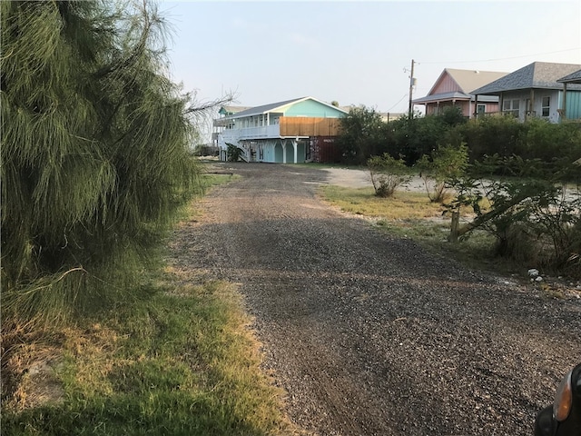 view of back house at dusk