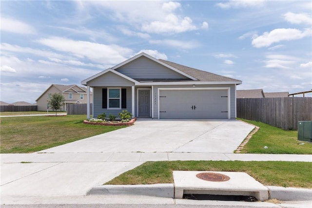13245 Wrangler St, Robstown, TX 78380 - ranch-style home featuring a front yard, a garage, and fence