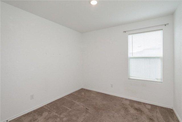 13245 Wrangler St, Robstown, TX 78380 - carpeted spare room with baseboards