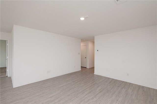 13245 Wrangler St, Robstown, TX 78380 - unfurnished room featuring baseboards and light wood finished floors