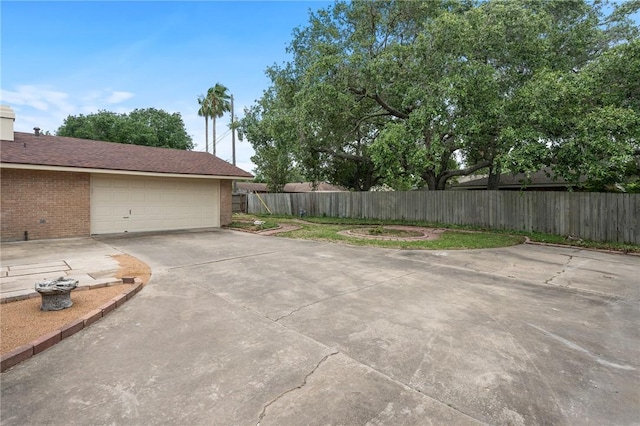 502 Meadowbrook Dr, Corpus Christi, TX 78412 - view of patio / terrace featuring fence and a garage