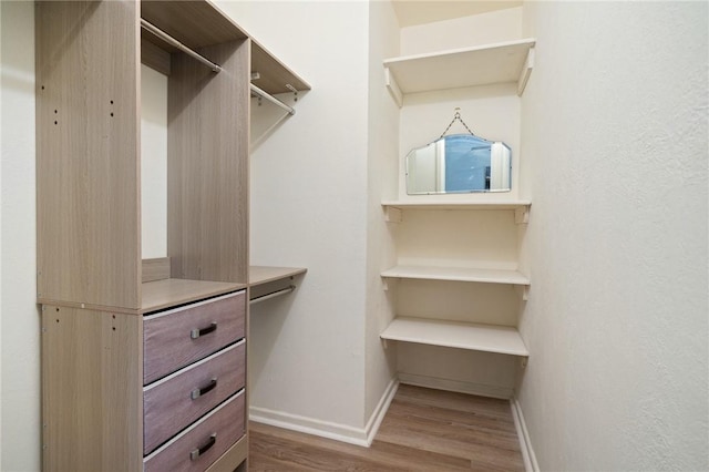 502 Meadowbrook Dr, Corpus Christi, TX 78412 - spacious closet featuring wood finished floors
