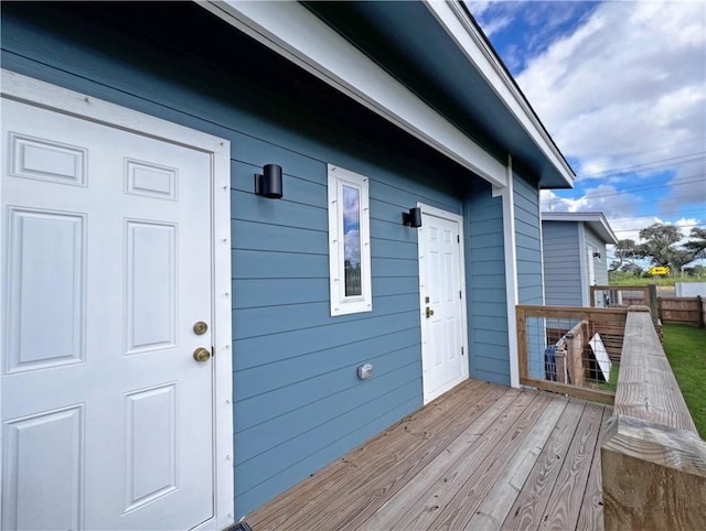 doorway to property featuring a deck