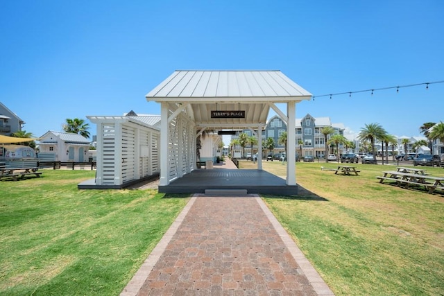 exterior space with a residential view and a yard