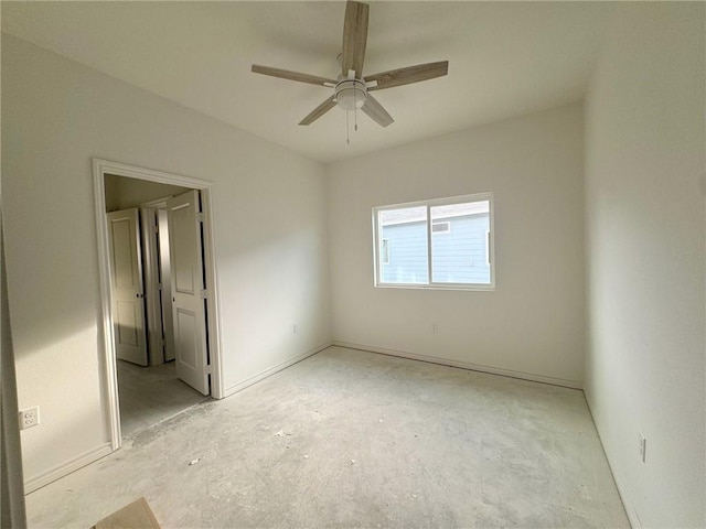 spare room with ceiling fan