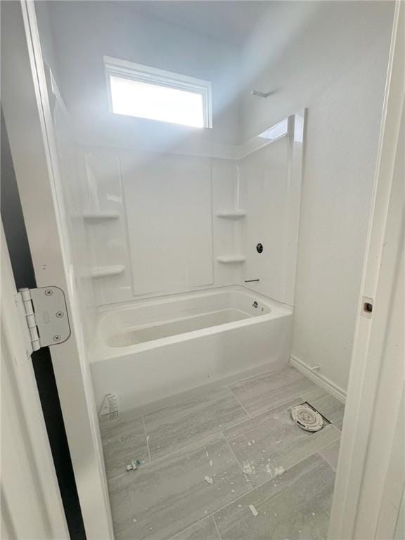 bathroom with shower / bathing tub combination