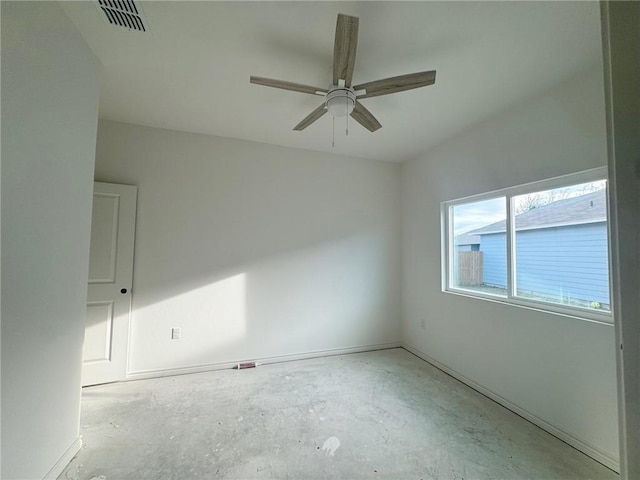 spare room with ceiling fan