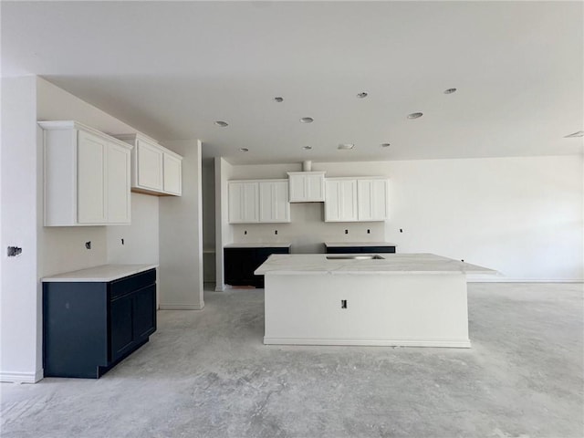 kitchen featuring white cabinetry and a center island