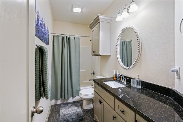 full bathroom featuring toilet, vanity, and shower / tub combo with curtain