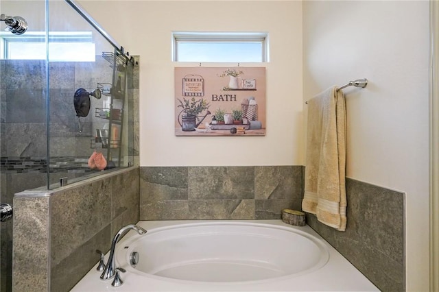 bathroom with a tub