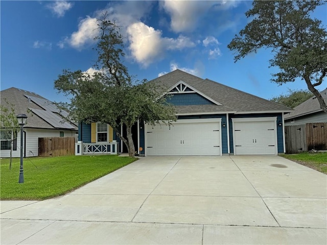 view of front of home featuring an attached garage, driveway, a shingled roof, and a porch